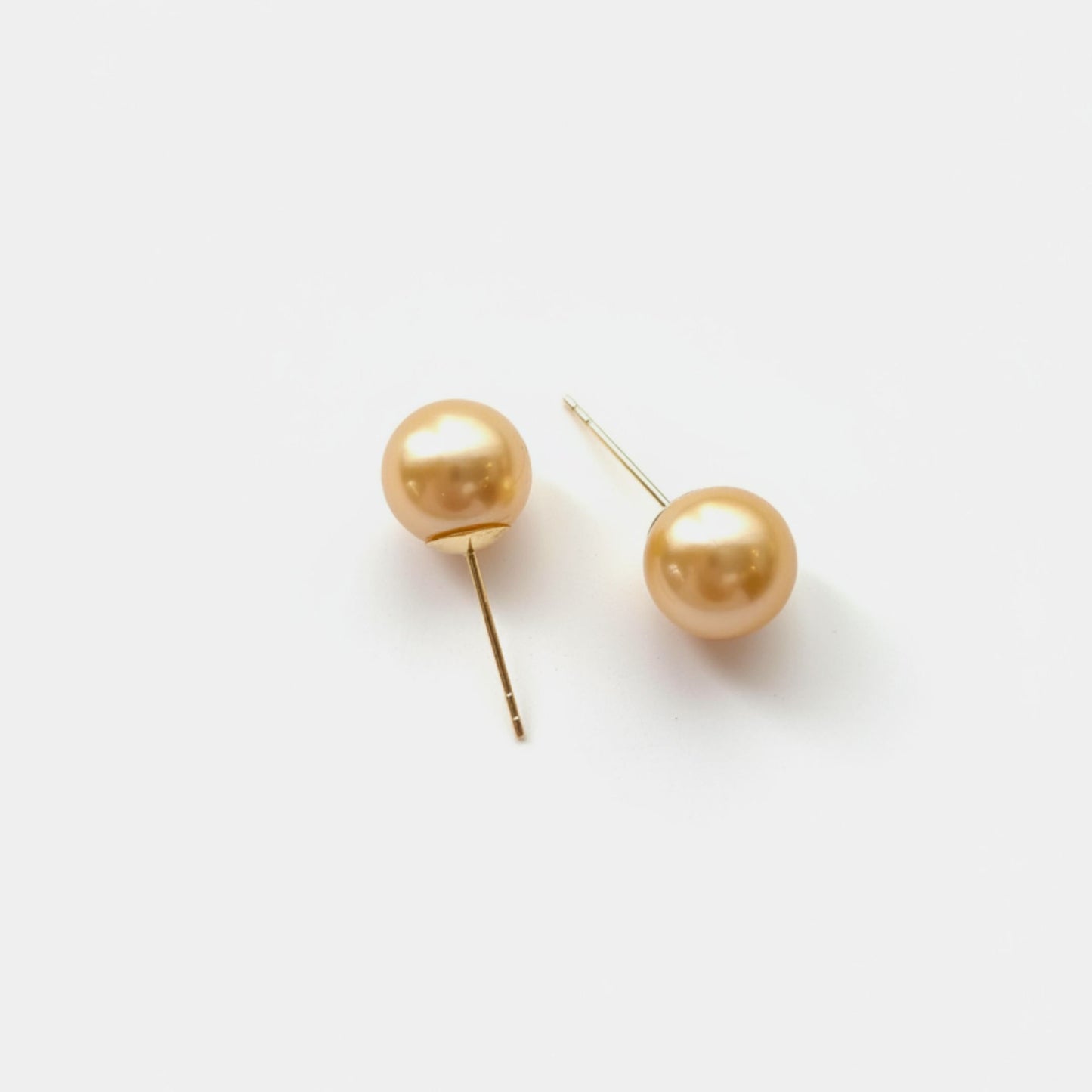 golden pearl studs