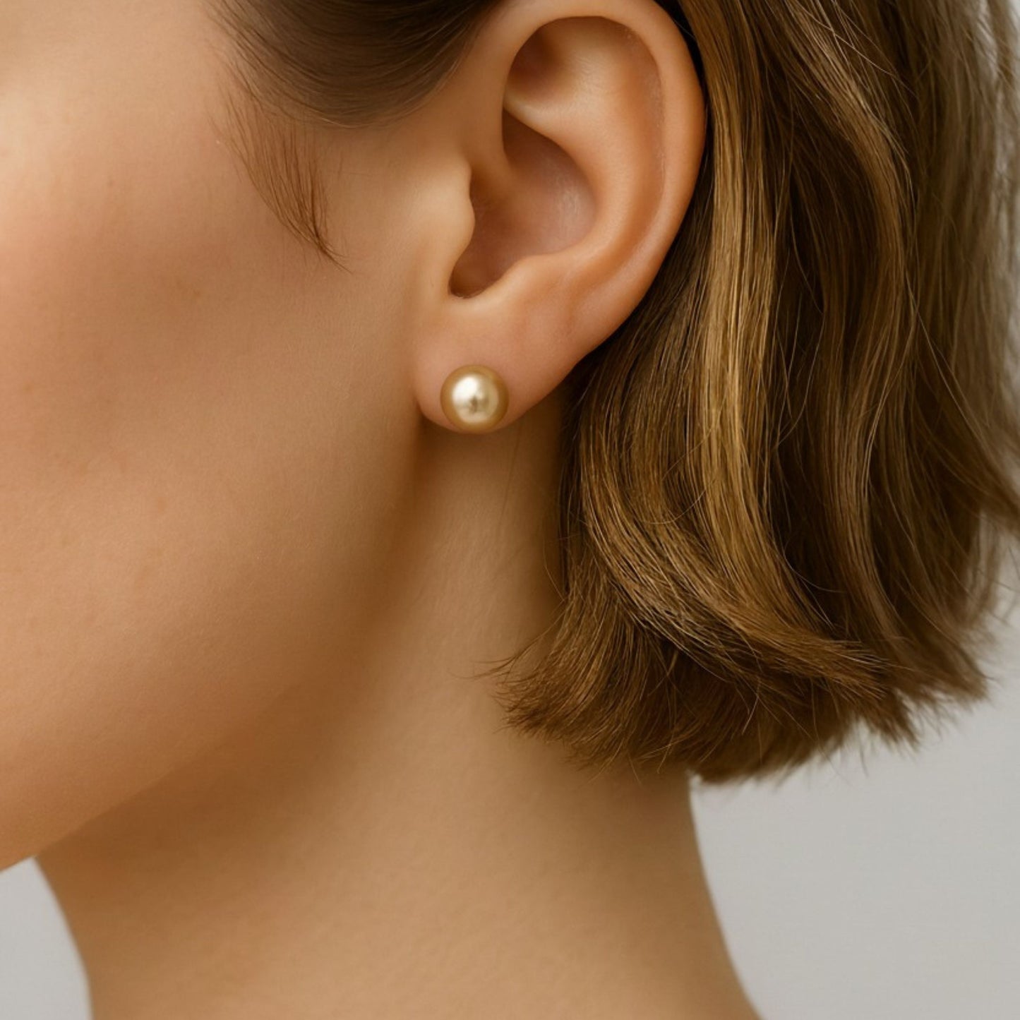 golden pearl studs