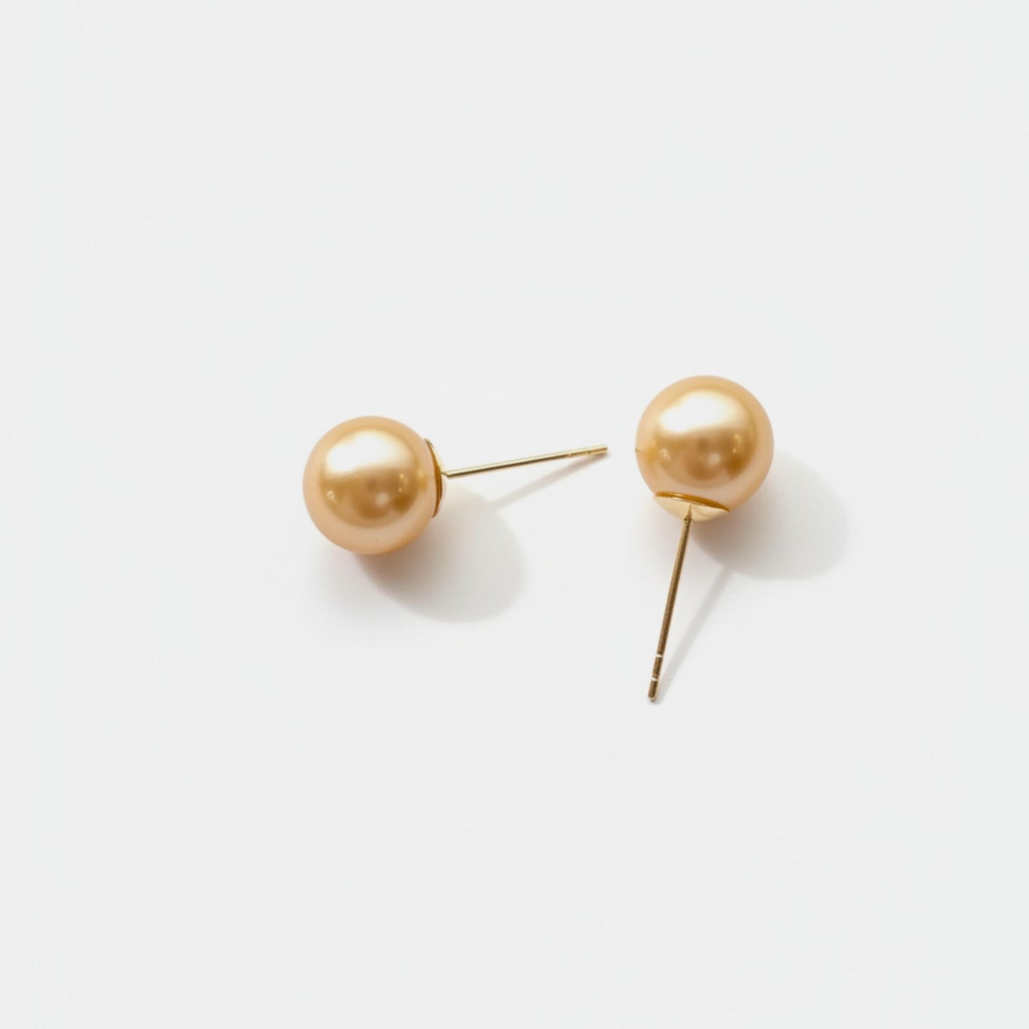golden pearl studs