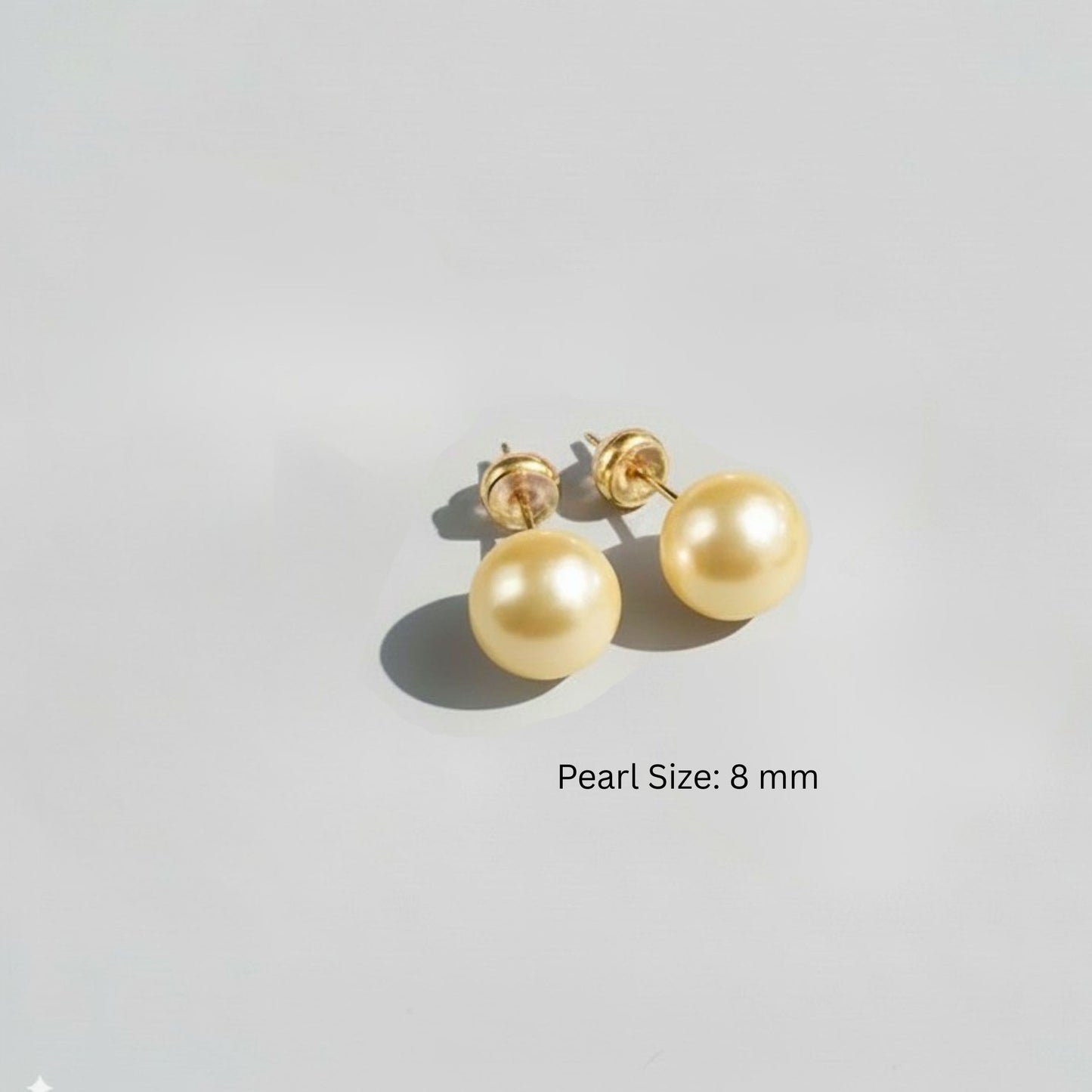 golden pearl studs